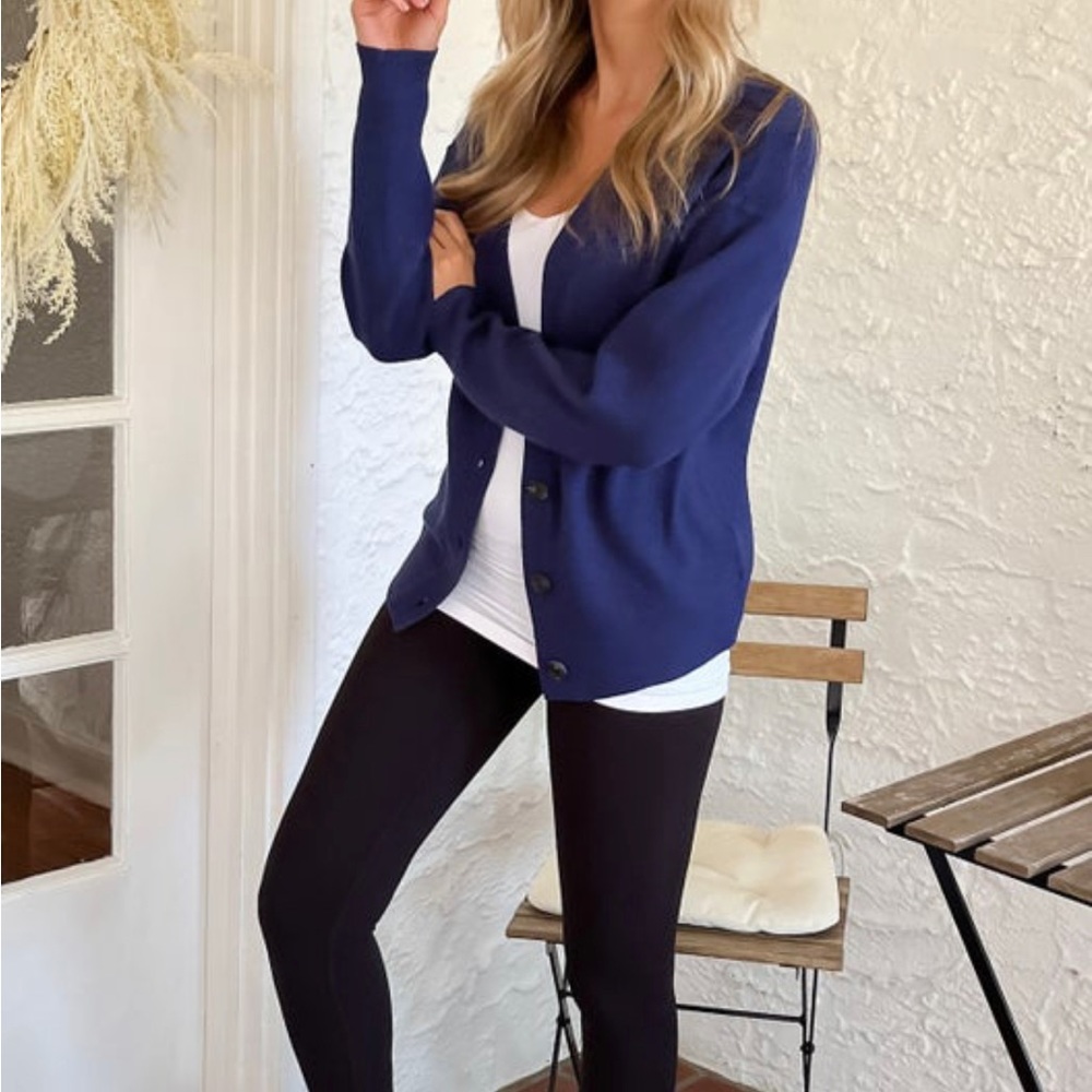 Navy Cardigan. New without tags.